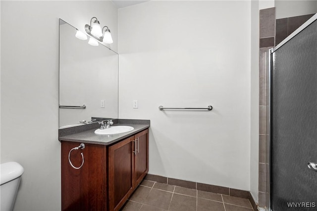 210 Ellicott St Unit 501, Buffalo, NY 14203 - full bathroom with vanity, tile patterned floors, and a shower with shower door