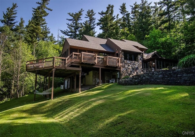1929 Chard Rd, Cazenovia, NY 13035 - rear view of property with a wooden deck, a yard, and stone siding