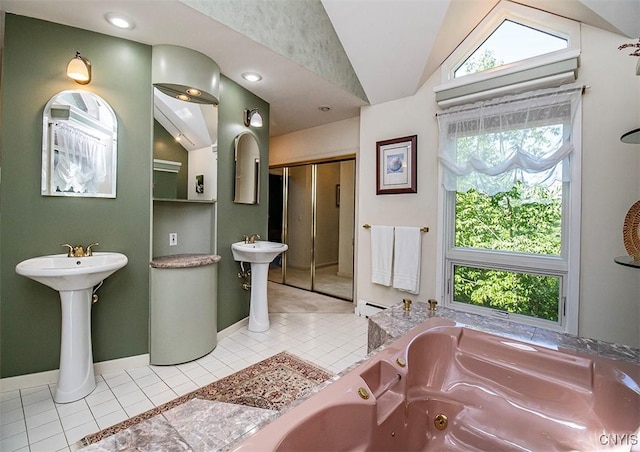 1929 Chard Rd, Cazenovia, NY 13035 - bathroom with vaulted ceiling, tile patterned flooring, plenty of natural light, a jetted tub, and a shower stall