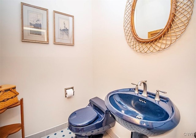 1929 Chard Rd, Cazenovia, NY 13035 - bathroom featuring a sink and baseboards