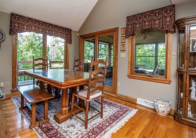 1929 Chard Rd, Cazenovia, NY 13035 - dining room featuring lofted ceiling, light wood finished floors, and french doors