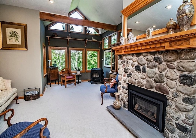 1929 Chard Rd, Cazenovia, NY 13035 - living area with a wood stove, carpet, healthy amount of natural light, lofted ceiling, and recessed lighting