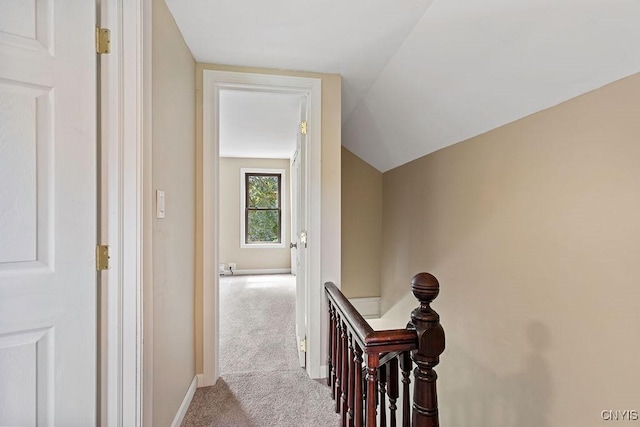 81 E 10th St, Oswego, NY 13126 - hallway featuring carpet flooring, an upstairs landing, and lofted ceiling