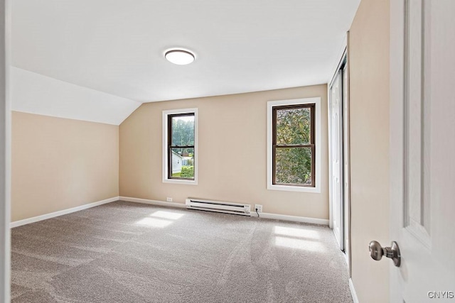 81 E 10th St, Oswego, NY 13126 - bonus room with a baseboard radiator, carpet flooring, healthy amount of natural light, and vaulted ceiling