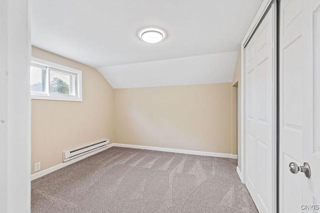 81 E 10th St, Oswego, NY 13126 - bonus room featuring a baseboard heating unit, carpet floors, and lofted ceiling