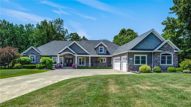 4614 Vrooman Dr, Lewiston, NY 14092 - craftsman-style house featuring stone siding, an attached garage, driveway, and a front lawn