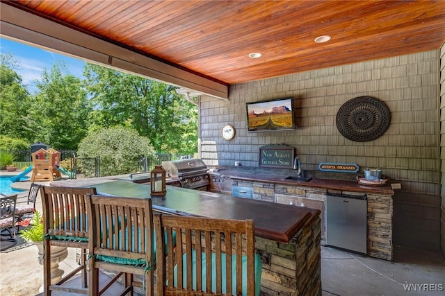 4614 Vrooman Dr, Lewiston, NY 14092 - view of patio / terrace with exterior kitchen