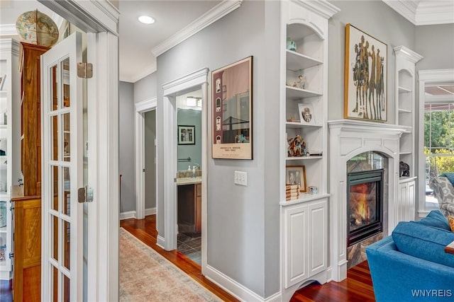 4614 Vrooman Dr, Lewiston, NY 14092 - hallway with wood finished floors, ornamental molding, built in features, and recessed lighting