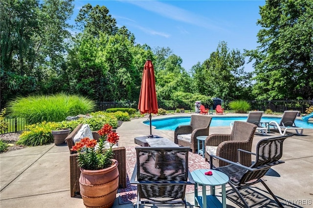 4614 Vrooman Dr, Lewiston, NY 14092 - view of patio featuring view of wooded area
