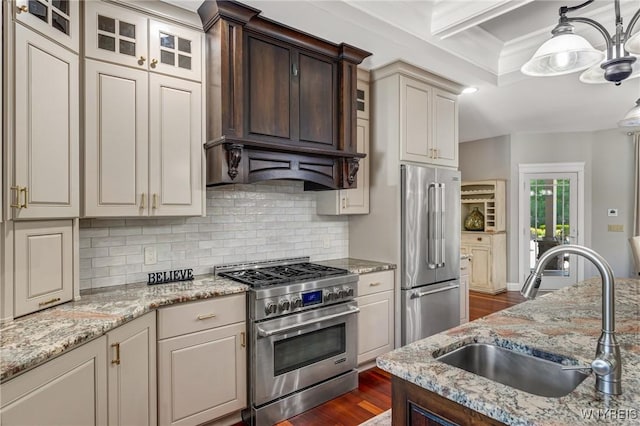 4614 Vrooman Dr, Lewiston, NY 14092 - kitchen with high quality appliances, dark wood-type flooring, ventilation hood, backsplash, and crown molding