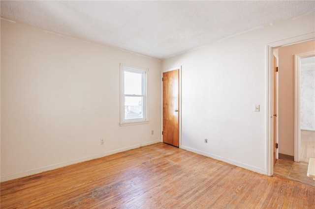 232 W Ivy St, East Rochester, NY 14445 - spare room with light wood-style floors