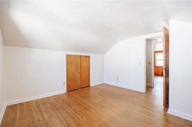 232 W Ivy St, East Rochester, NY 14445 - additional living space with vaulted ceiling and light wood finished floors