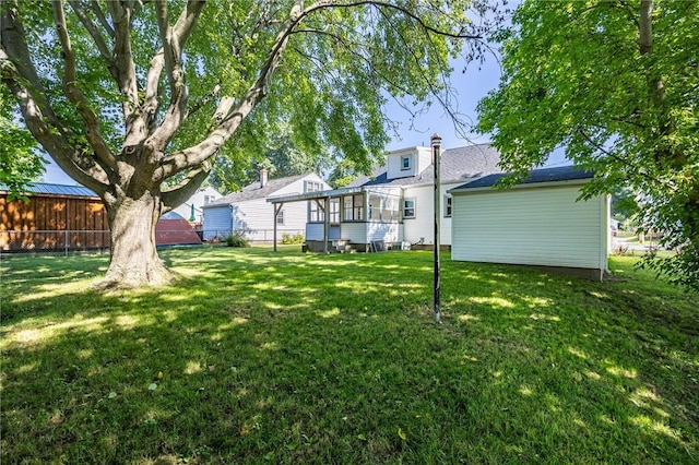 232 W Ivy St, East Rochester, NY 14445 - view of yard featuring a sunroom