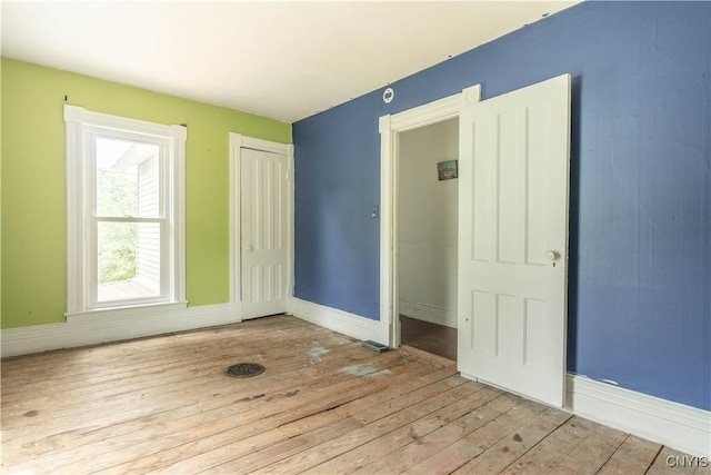 662 Burchard St, Watertown City, NY 13601 - empty room featuring hardwood / wood-style floors and baseboards