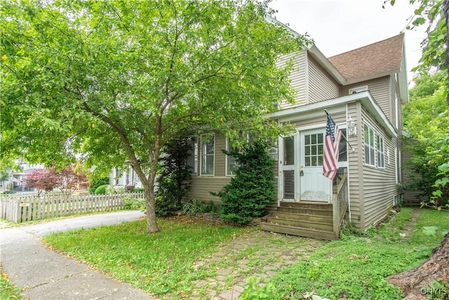 662 Burchard St, Watertown City, NY 13601 - view of property hidden behind natural elements featuring entry steps