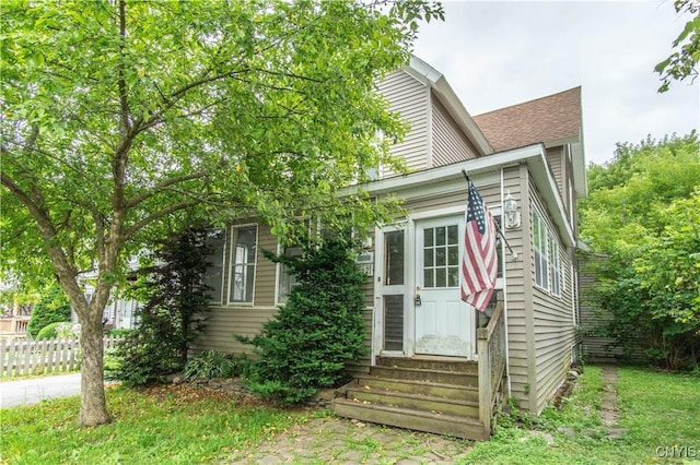 662 Burchard St, Watertown City, NY 13601 - view of front facade with entry steps and a shingled roof