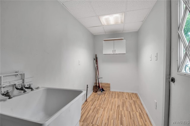 74 Bush St, Buffalo, NY 14207 - bathroom featuring a drop ceiling and wood finished floors