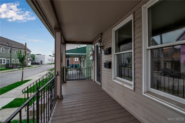 74 Bush St, Buffalo, NY 14207 - wooden porch with a residential view