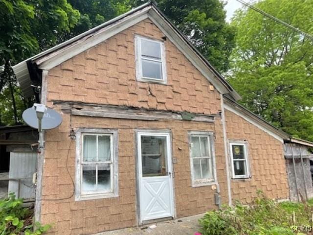29 Moss St, New Berlin, NY 13411 - view of side of home featuring view of wooded area