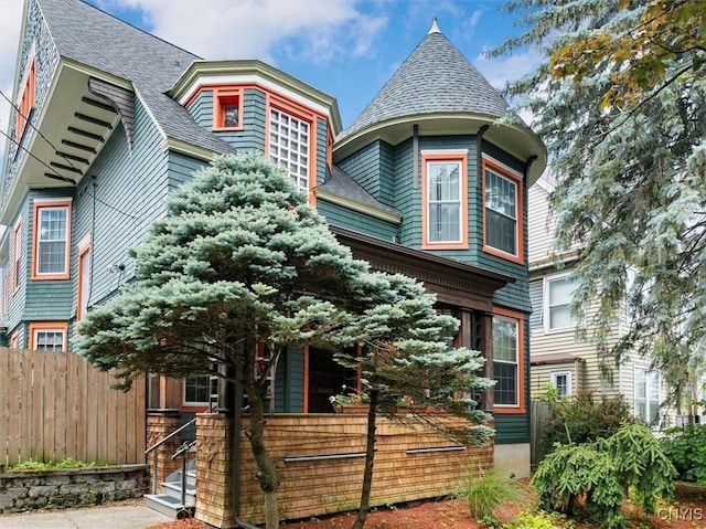 4 Jewett Pl, Utica, NY 13501 - victorian home featuring roof with shingles