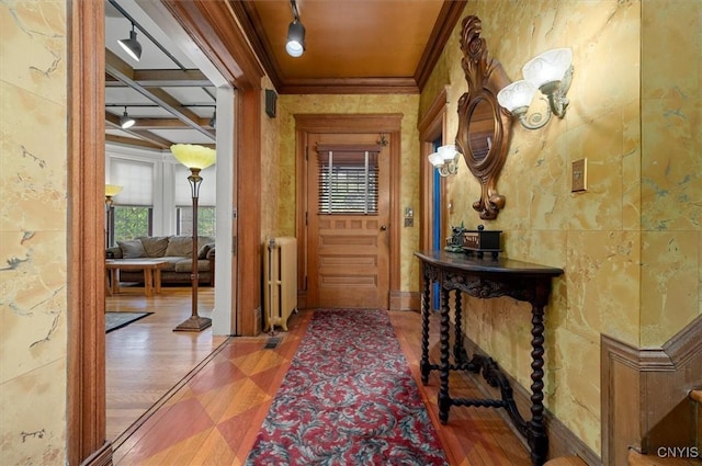 4 Jewett Pl, Utica, NY 13501 - entrance foyer featuring radiator, ornamental molding, wood finished floors, beam ceiling, and coffered ceiling