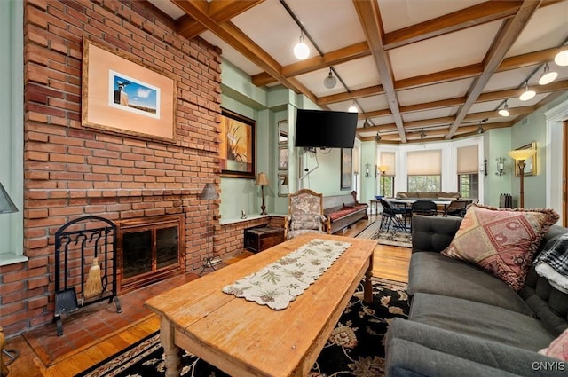 4 Jewett Pl, Utica, NY 13501 - living room with coffered ceiling, wood finished floors, beamed ceiling, and a brick fireplace