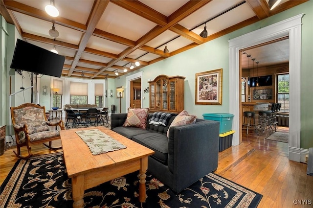 4 Jewett Pl, Utica, NY 13501 - living area with hardwood / wood-style floors, coffered ceiling, beam ceiling, and radiator heating unit