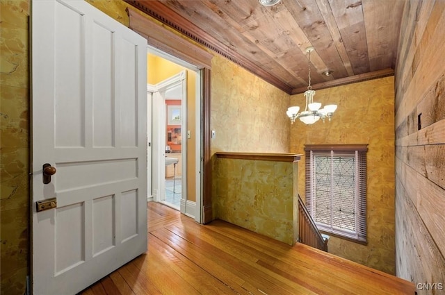 4 Jewett Pl, Utica, NY 13501 - unfurnished dining area with a chandelier, hardwood / wood-style flooring, wooden ceiling, and ornamental molding