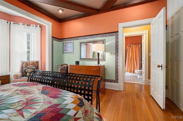 4 Jewett Pl, Utica, NY 13501 - bedroom with light wood-type flooring and beamed ceiling
