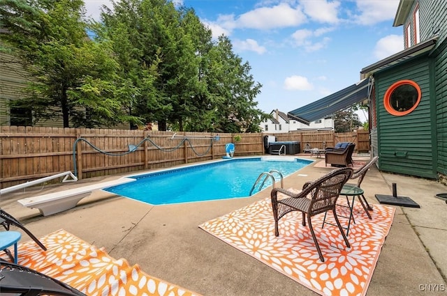 4 Jewett Pl, Utica, NY 13501 - view of swimming pool featuring a patio area, a diving board, and a fenced backyard