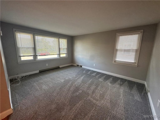 207 Waverly Ave, Tonawanda, NY 14217 - unfurnished room featuring dark colored carpet and baseboards