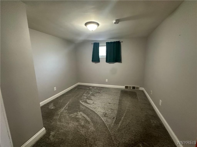 207 Waverly Ave, Tonawanda, NY 14217 - carpeted spare room with baseboards and a smoke detector