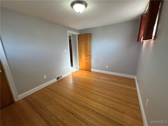 207 Waverly Ave, Tonawanda, NY 14217 - unfurnished room featuring light wood finished floors and baseboards