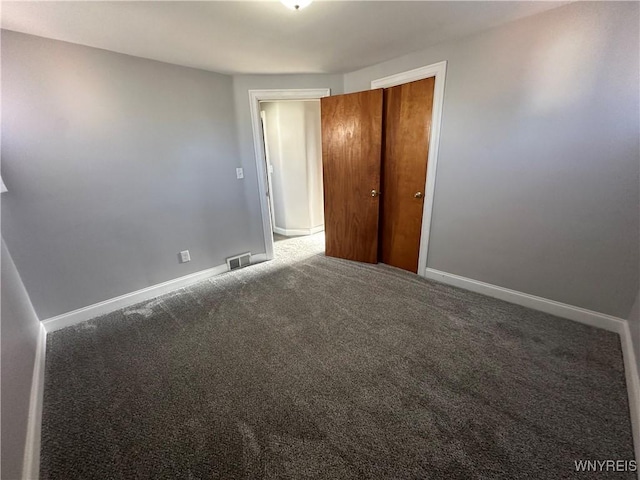 207 Waverly Ave, Tonawanda, NY 14217 - unfurnished bedroom with carpet flooring and a closet