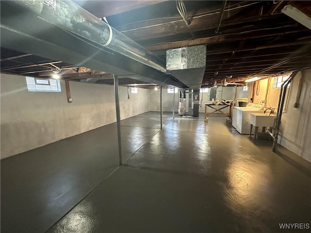 207 Waverly Ave, Tonawanda, NY 14217 - below grade area featuring separate washer and dryer and a sink