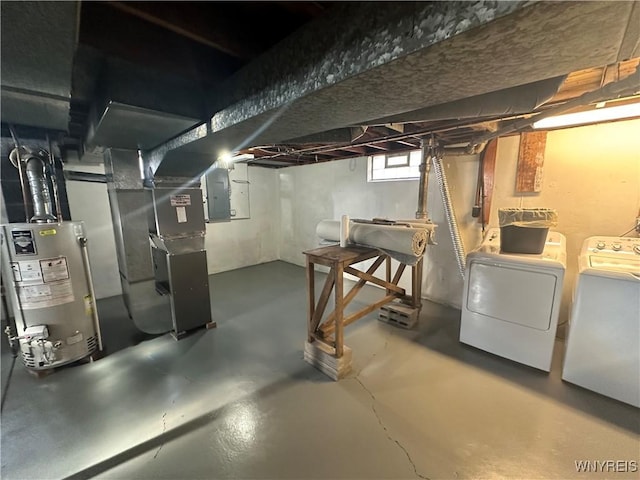 207 Waverly Ave, Tonawanda, NY 14217 - below grade area with gas water heater, separate washer and dryer, electric panel, and heating unit