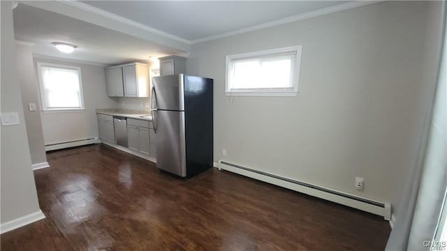429 S Hamilton St, Watertown City, NY 13601 - kitchen with appliances with stainless steel finishes, a baseboard radiator, dark wood-style floors, and ornamental molding
