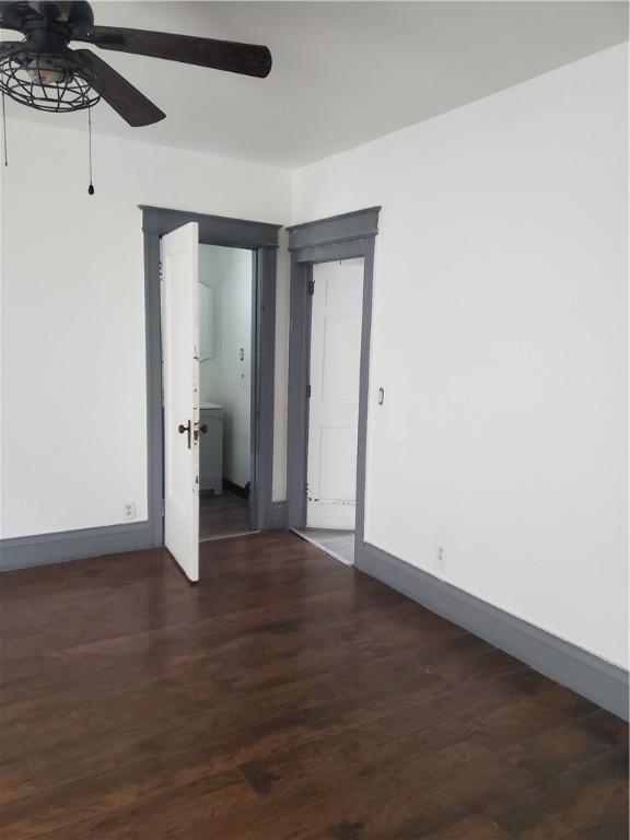 285 Magee Ave, Rochester, NY 14613 - empty room featuring ceiling fan and dark wood finished floors