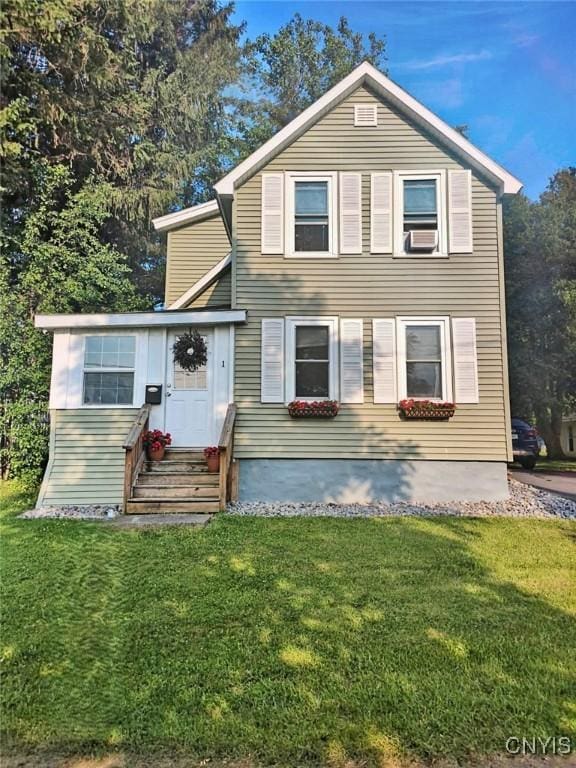 1 Mcbride St, Kirkland, NY 13323 - traditional-style house with entry steps, a front yard, and cooling unit