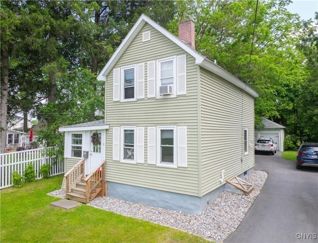 1 Mcbride St, Kirkland, NY 13323 - view of front of property with a chimney and a detached garage
