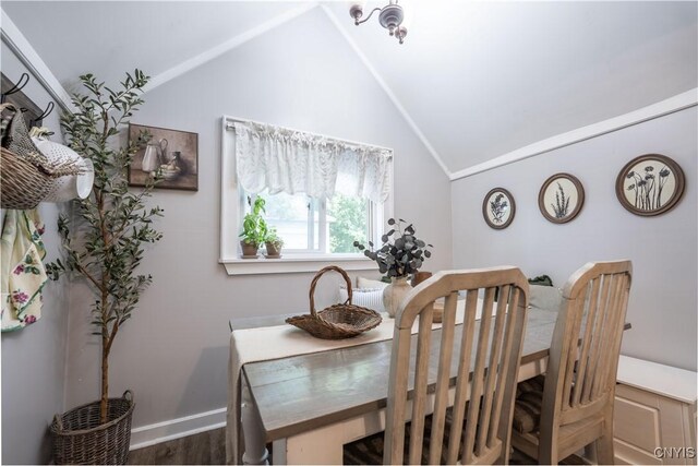 1 Mcbride St, Kirkland, NY 13323 - dining area with vaulted ceiling and dark wood-style flooring