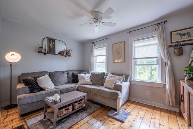 1 Mcbride St, Kirkland, NY 13323 - living area featuring ceiling fan and light wood-style flooring