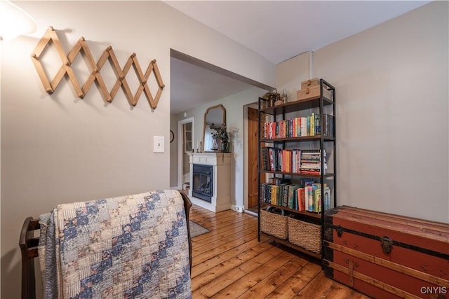 1 Mcbride St, Kirkland, NY 13323 - sitting room featuring a fireplace and light wood-style floors