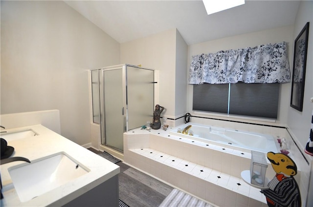122 Thorn Apple Ln, Greece, NY 14626 - full bath with a stall shower, a whirlpool tub, double vanity, wood finished floors, and lofted ceiling