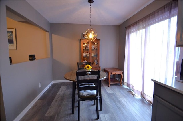 122 Thorn Apple Ln, Greece, NY 14626 - dining space featuring wood finished floors and baseboards