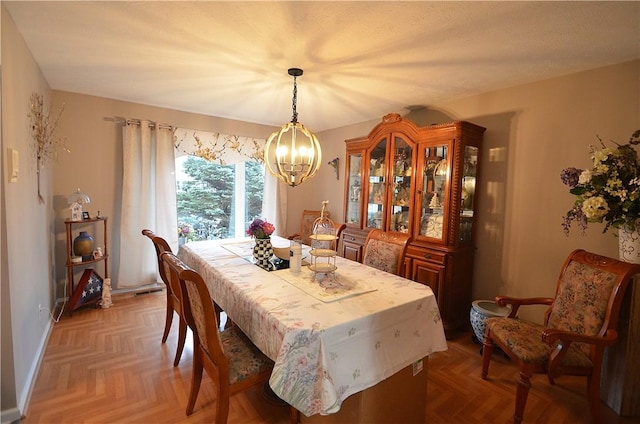 122 Thorn Apple Ln, Greece, NY 14626 - dining area featuring a chandelier and baseboards