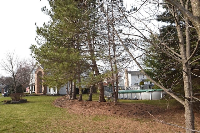 122 Thorn Apple Ln, Greece, NY 14626 - view of green lawn with a covered pool