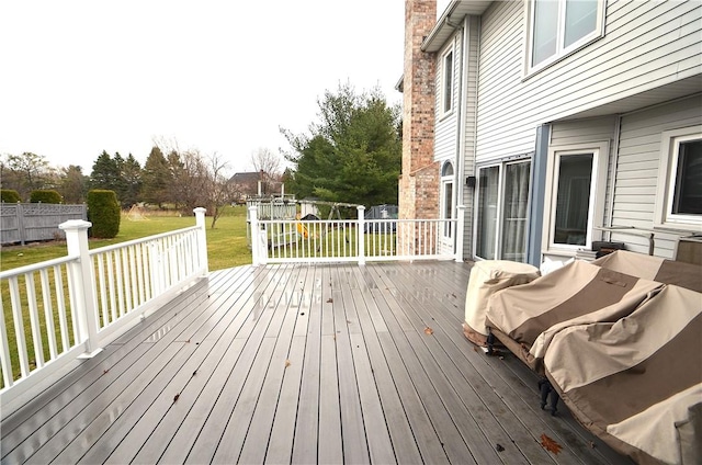 122 Thorn Apple Ln, Greece, NY 14626 - wooden deck featuring a lawn