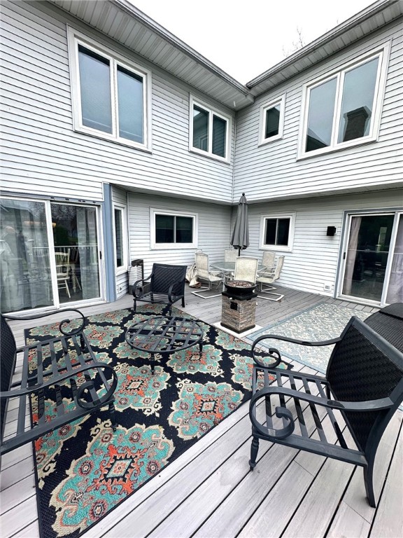 122 Thorn Apple Ln, Greece, NY 14626 - wooden deck with an outdoor living space