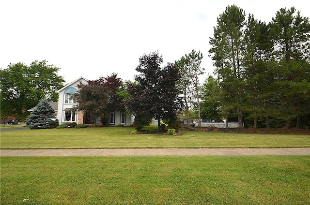 122 Thorn Apple Ln, Greece, NY 14626 - view of front of house with a front lawn